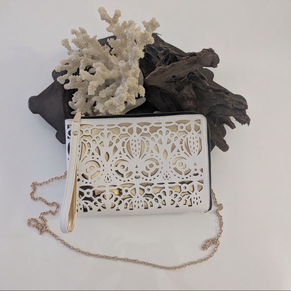 Melie Bianco Handbags - SALE Melie Bianco laser cut cross body/ clutch